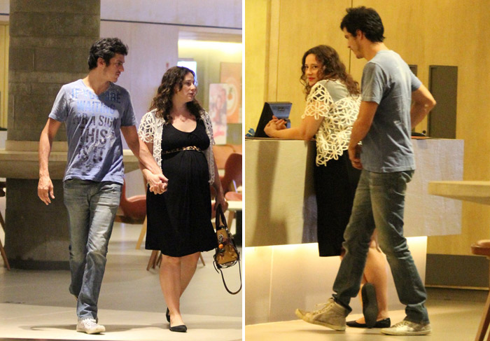  Grávida, Paula Braun exibe barrigão enquanto vai ao cinema com o marido em shopping do Rio