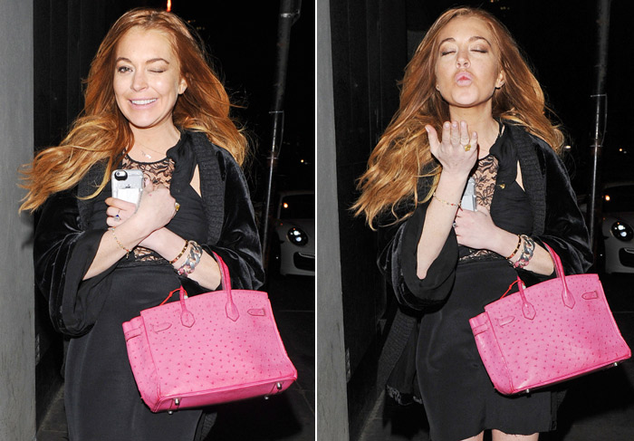  Lindsay Lohan manda beijo e piscadinha para paparazzi
