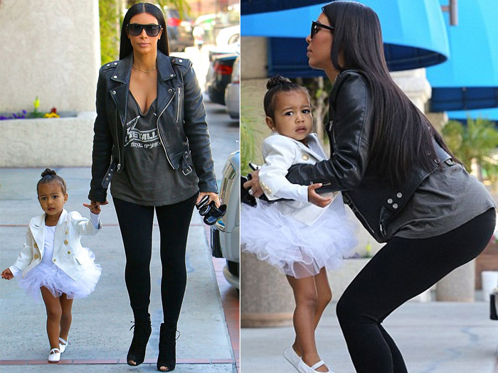 Kim Kardashian passeia com look decotado junto com a filha