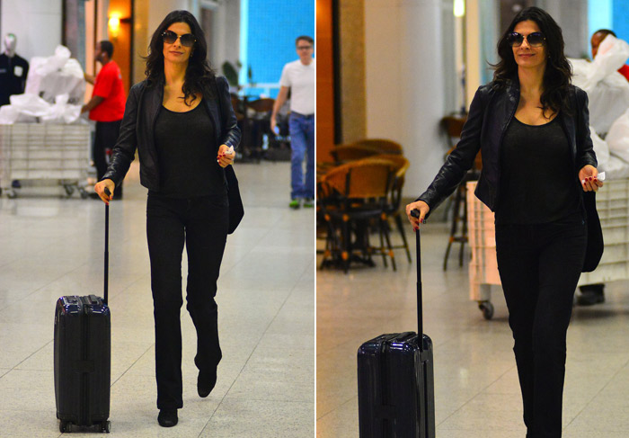 Elegante, Helena Ranaldi embarca em aeroporto carioca