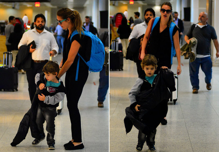 Filho de Letícia Birkheuer mostra independência no aeroporto