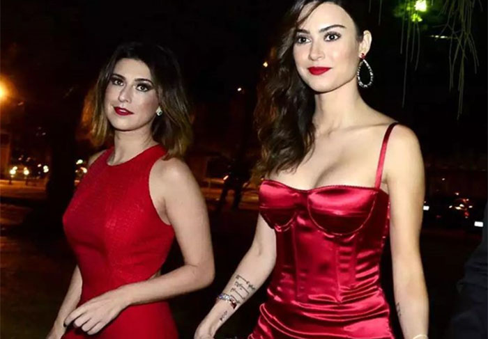 Fernanda Paes Leme e Thaila Ayala apostaram no vestido vermelho para prestigiarem o amigo famoso