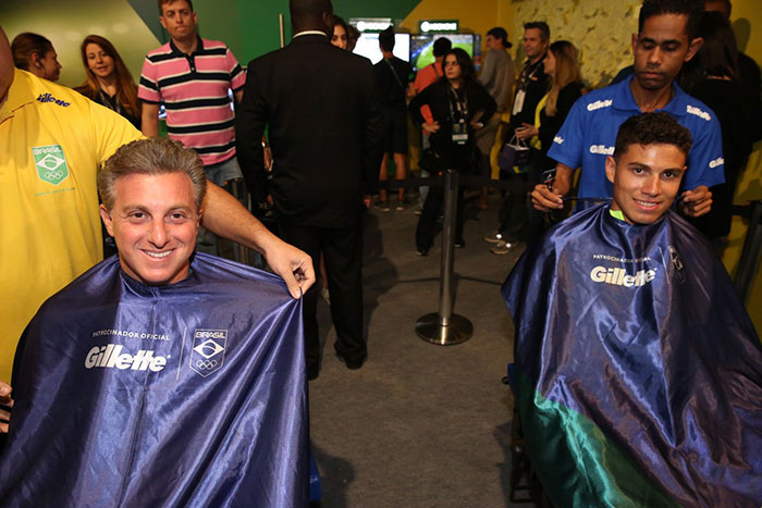 Luciano Huck e Thiago em evento