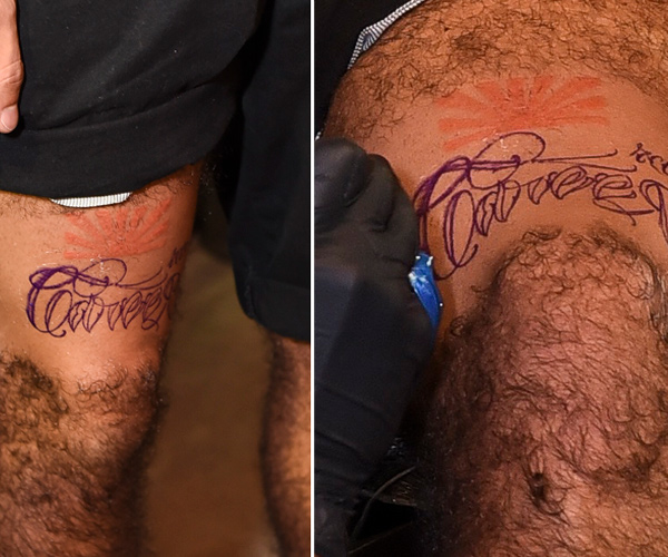No Sambódromo, Caio Castro faznova tatuagem na perna	