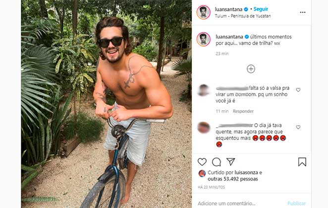 Luan Santana posou sem camisa em bicicleta no México