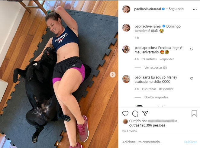 Paolla Oliveira descanso com o cachorro após treino