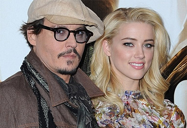 Johnny Depp e Amber Heard posam para as câmeras