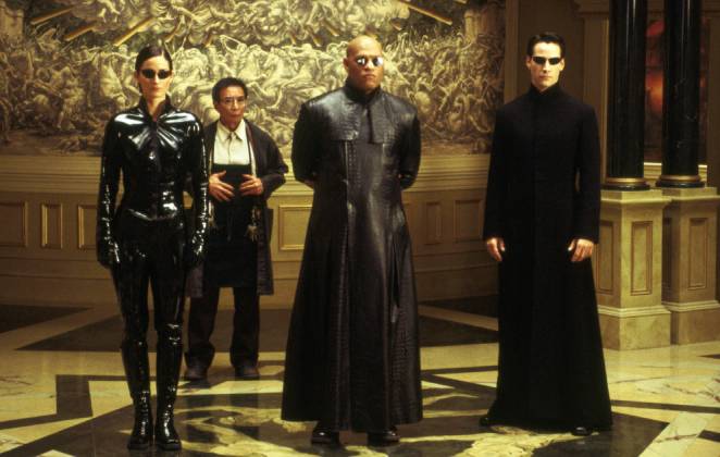 Clássica cena de Matrix com os personagens principais em pose de batalha