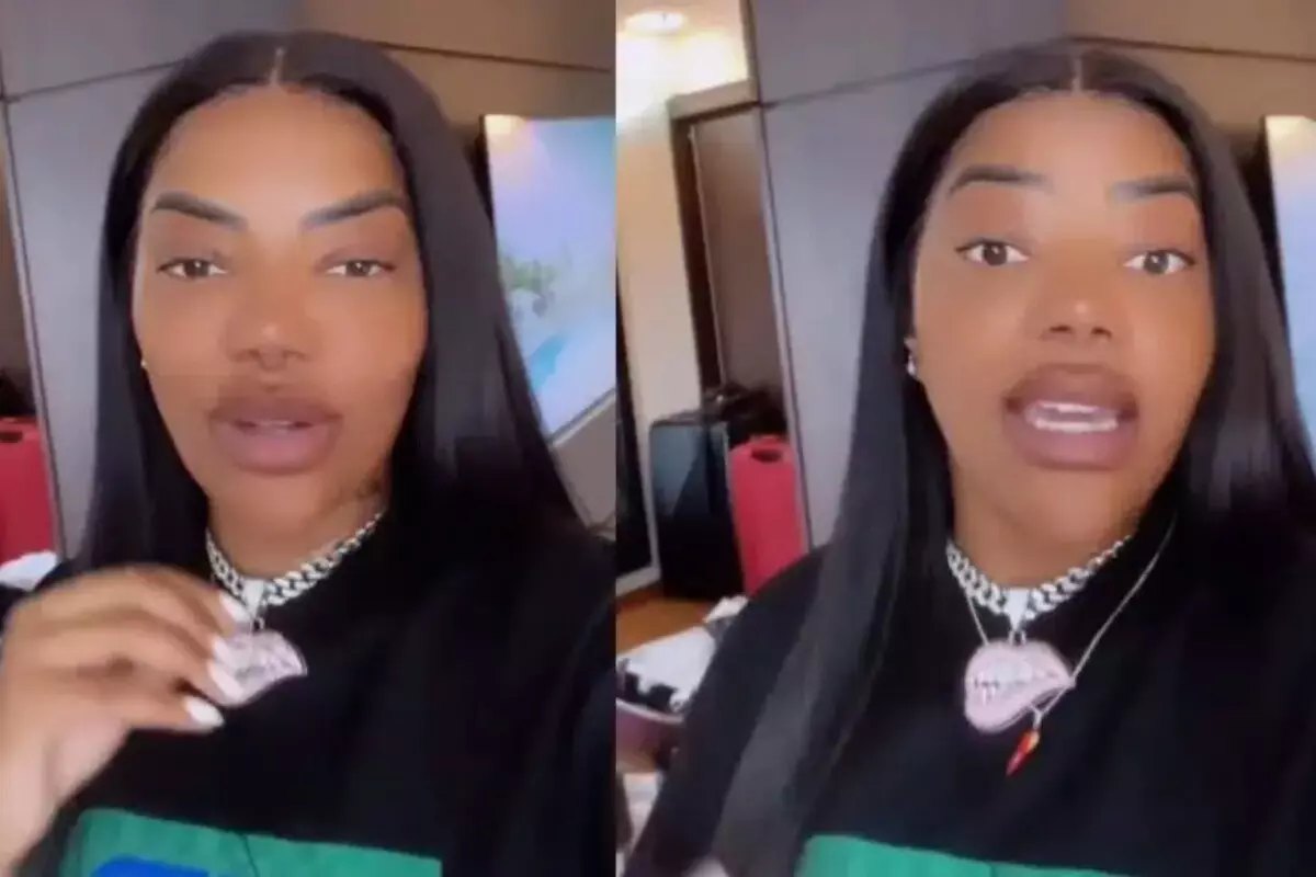 Ludmilla de camisa preta mostra colar