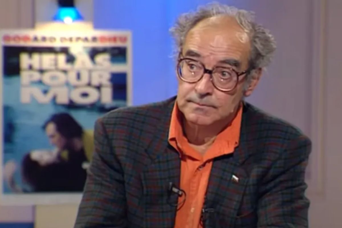 Jean-Luc Godard com olhar de espanto