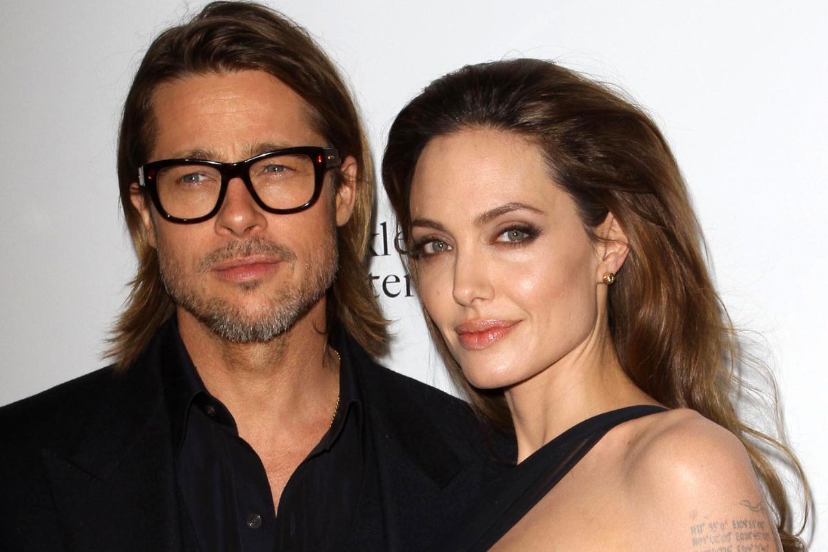 Brad Pitt ao lado de Angelina Jolie