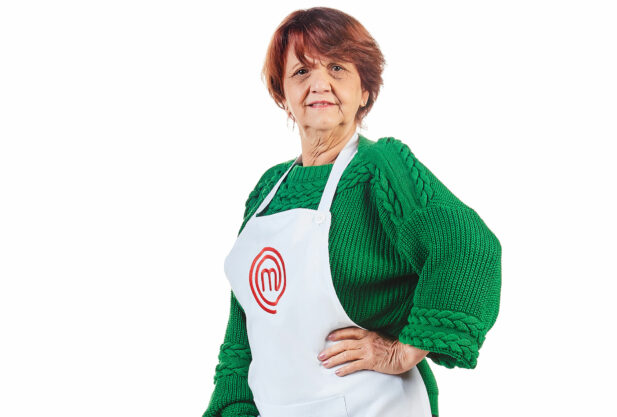 Participante Masterchef + com avental do programa