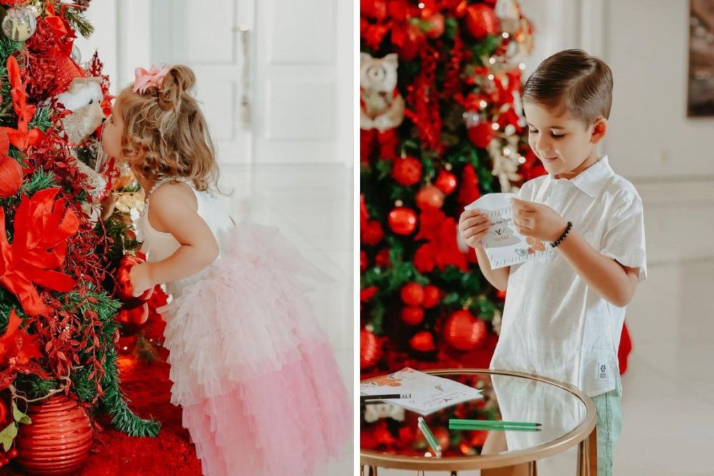 Filhos de Zé Neto perto da árvore de Natal