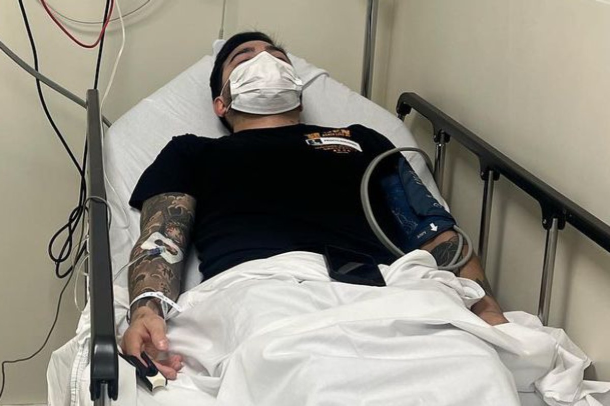 yudi tamashiro deitado em cama de hospital, inetrnado