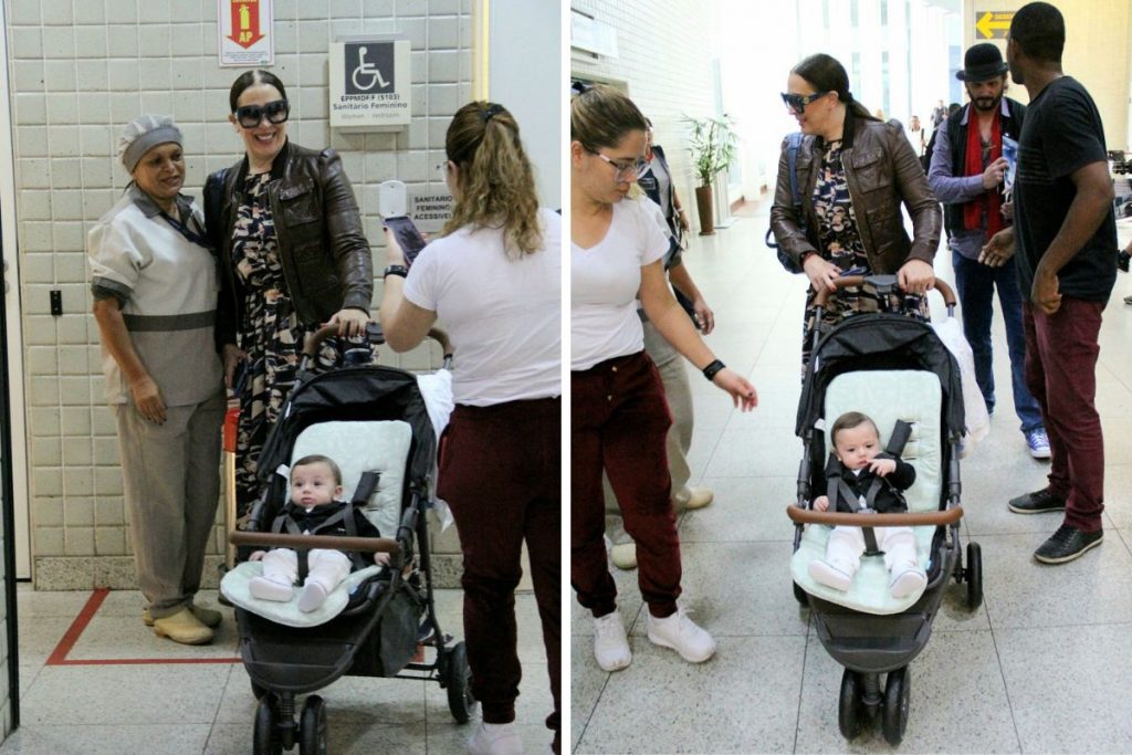 Claudia Raia posa com fã em aeroporto