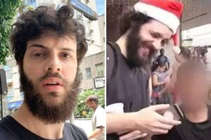 Diogo Defante de camisa preta de gorro e papai noel
