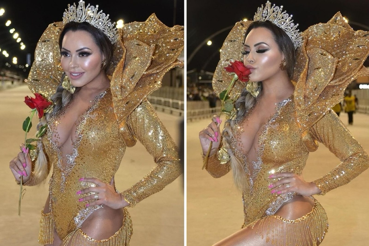 Carnaval SP - Ana Beatriz Godói, rainha da bateria da Rosas de Ouro, se look dourado, segurando uma rosa