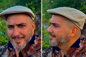 André Marques de boina e camisa estampada