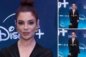 Gkay de vestido preto, cabelo preso