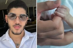 Zé Vaqueiro e a mão do filho Artur