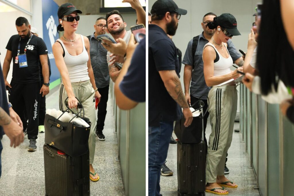 Fãs no aeroporto