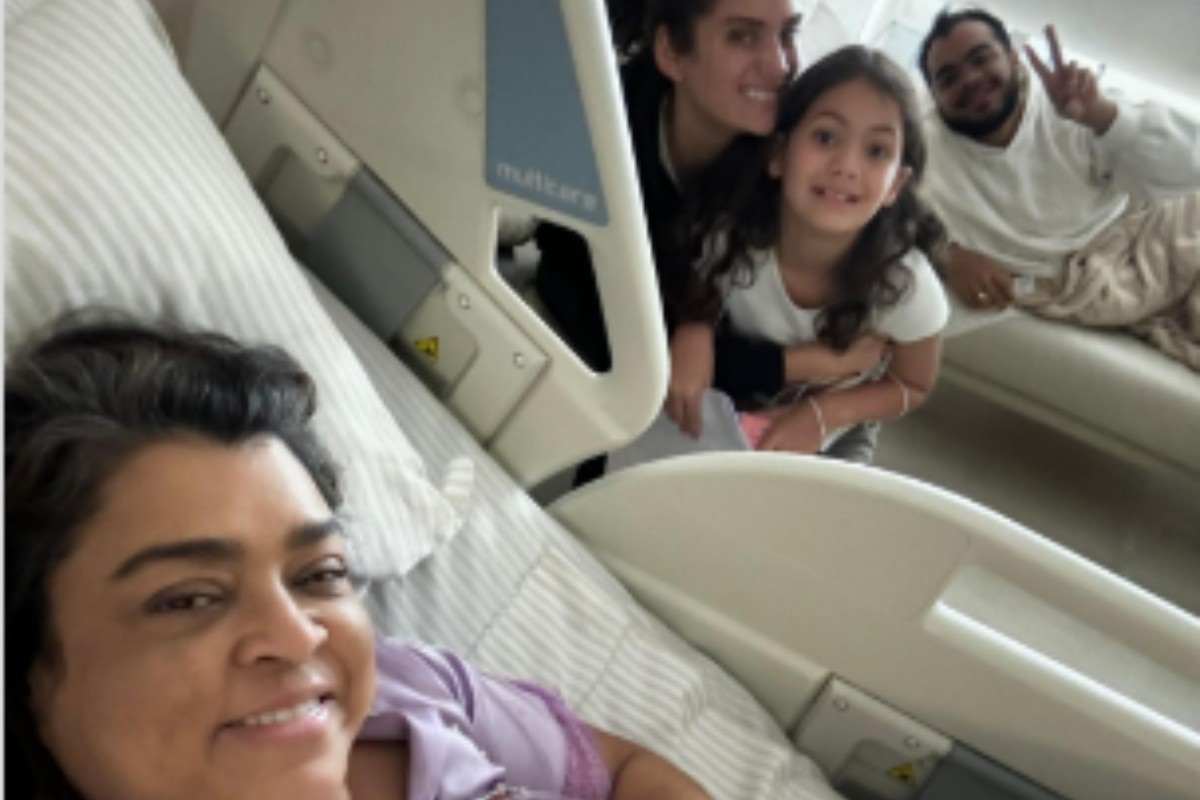 preta gil com filhos no hospital