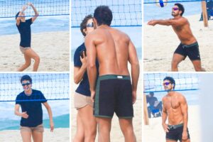 Agatha Moreira e Rodrigo Simas na praia jogando vôlei