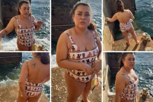 Preta Gil toma banho de mar