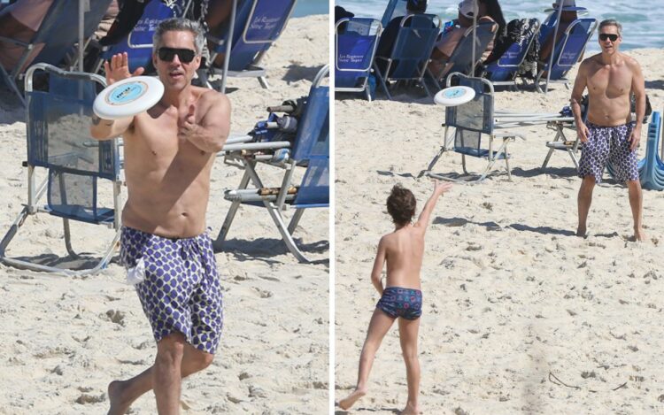 Alexandre Nero joga frisby com o filho. 