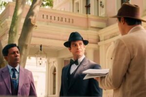 Celso (Rainer Cadete) tenta aplicar novo golpe em Candinho (Sergio Guizé) em 