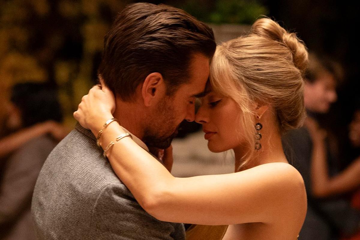 david (colin farrell) e sarah (margot robbie) em a grande viagem a sua vida