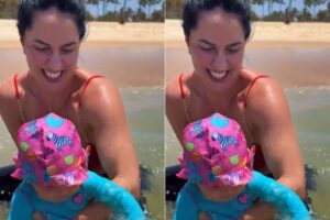 Graciele Lacerda e Clara na praia