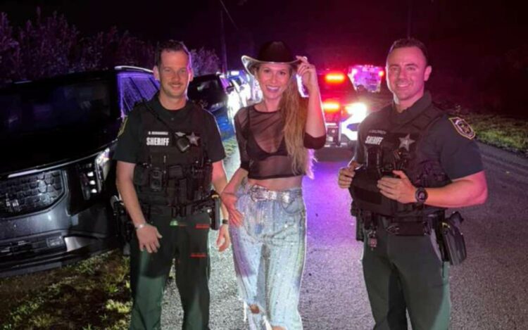 Lívia Andrade e policiais