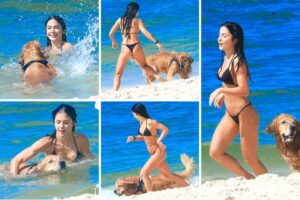 Jade Picon brinca com o cachorro na praia