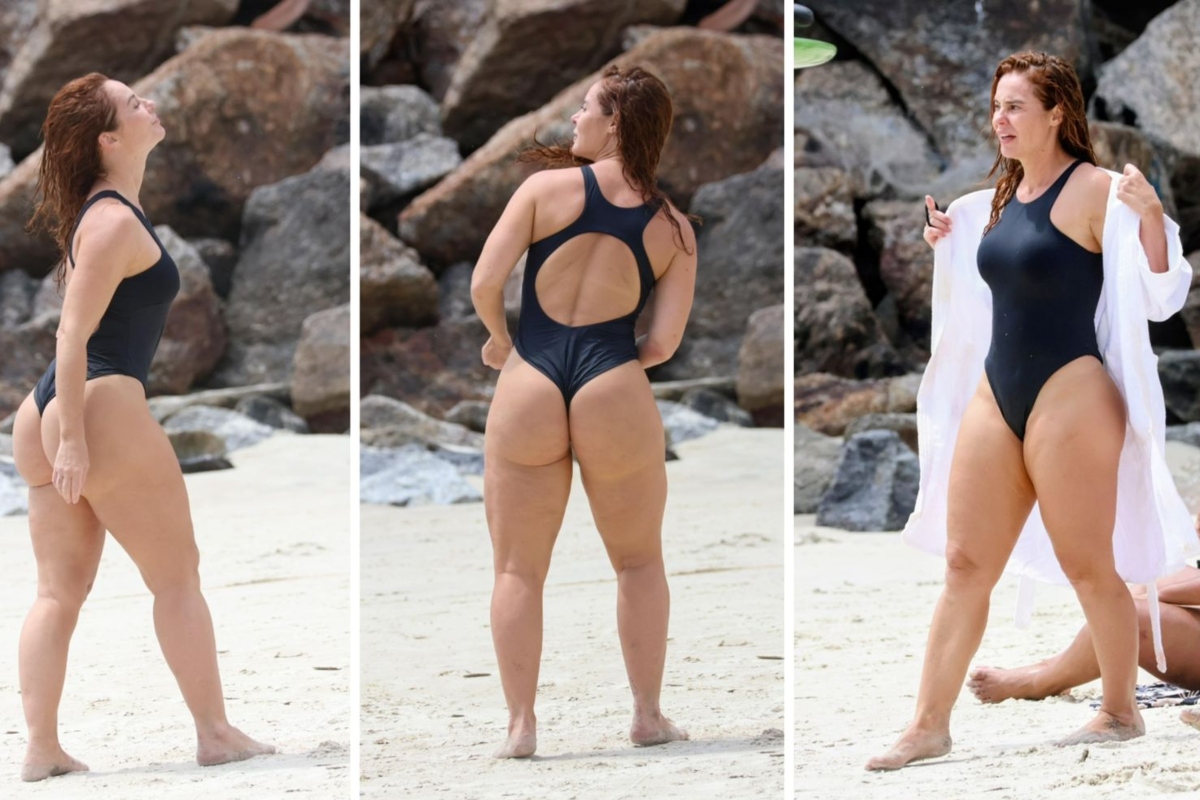 Paolla Oliveira de maiô preto na praia